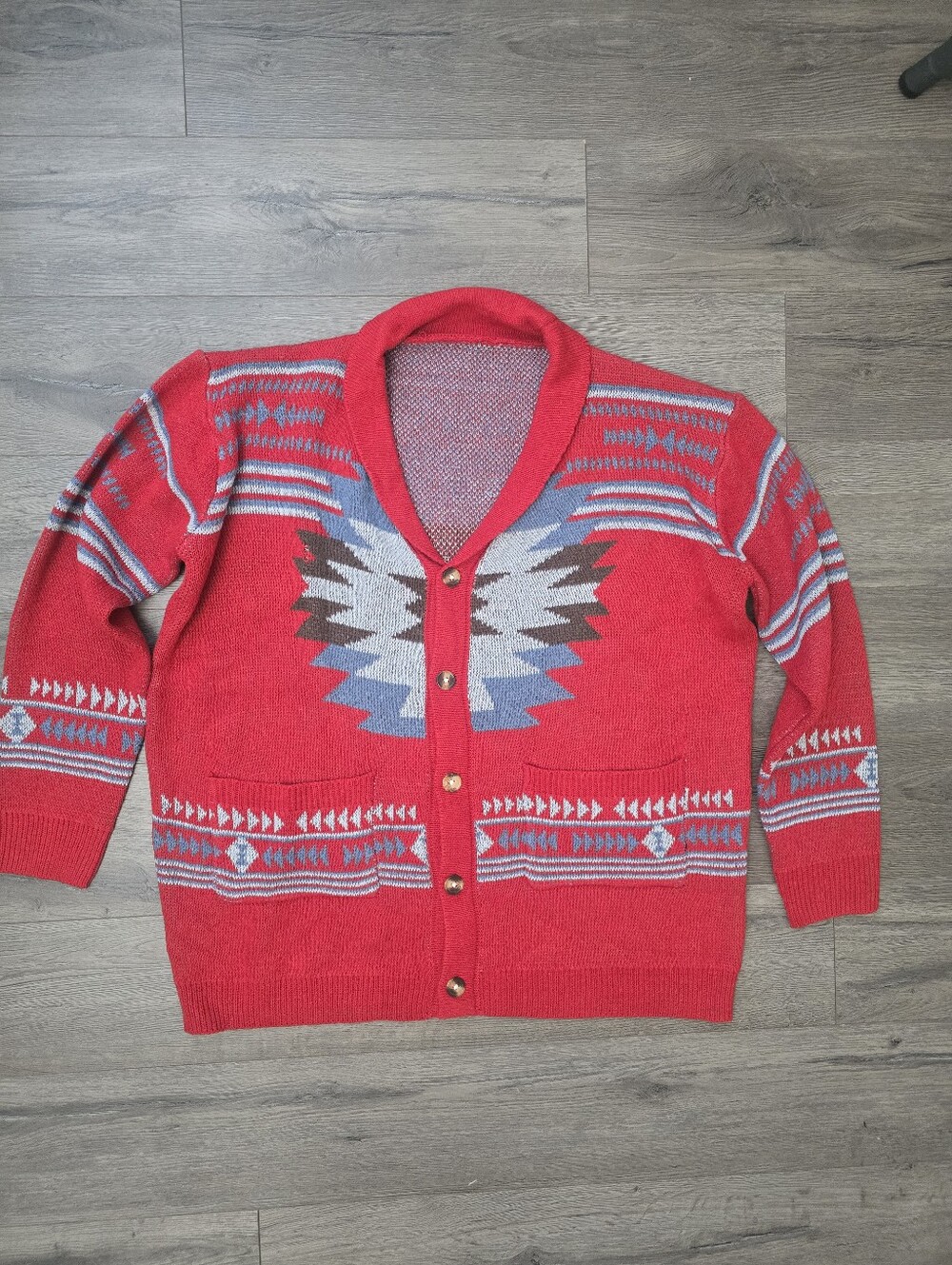 men's shawl collar cardigan features a southwestern-style geometric jacquard